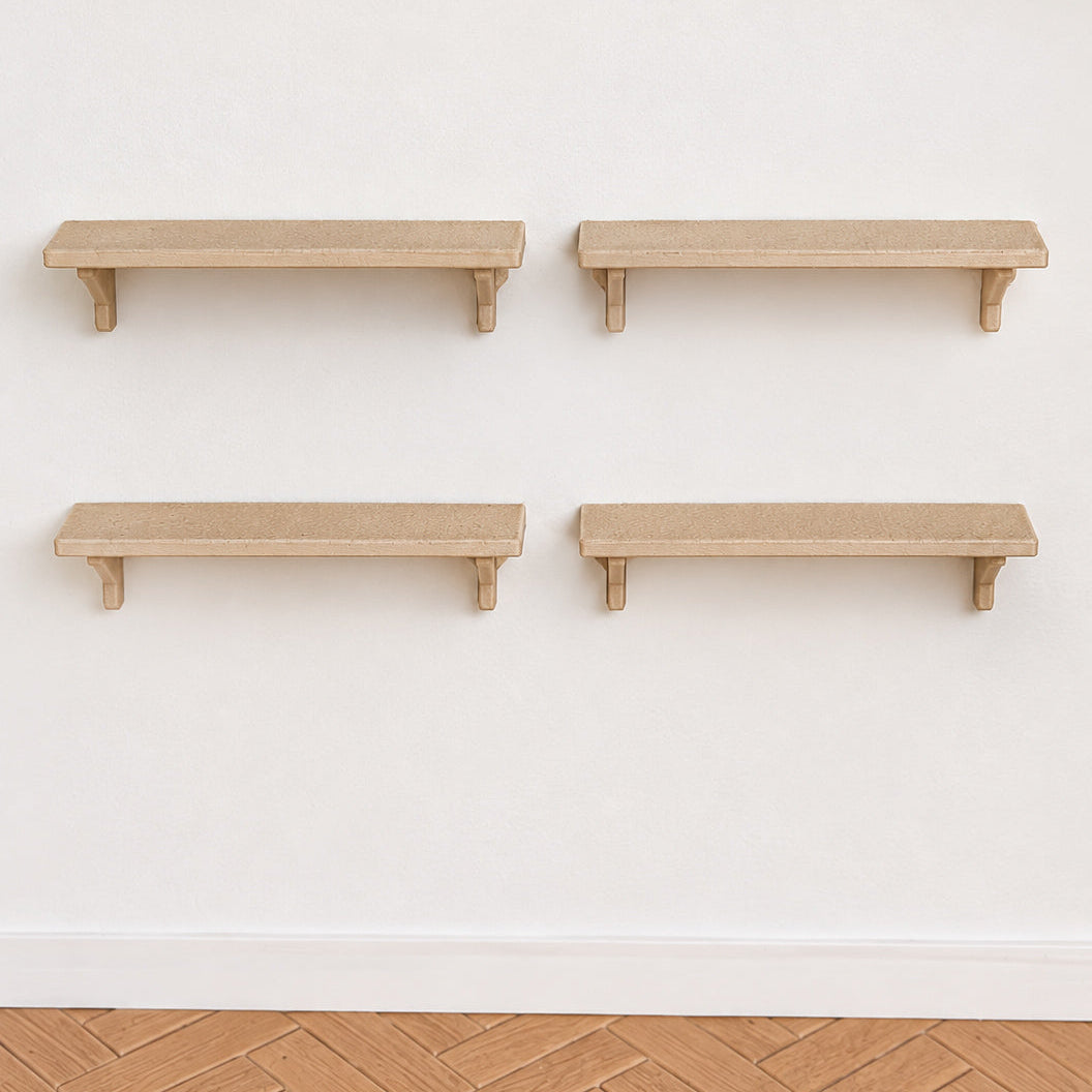 Set of 4 miniature wall shelves in light wood with bracket supports, mounted on a white wall above a herringbone floor